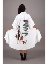 Load image into Gallery viewer, White shirt with colorful graphic design on the back, worn by a person against a gray background